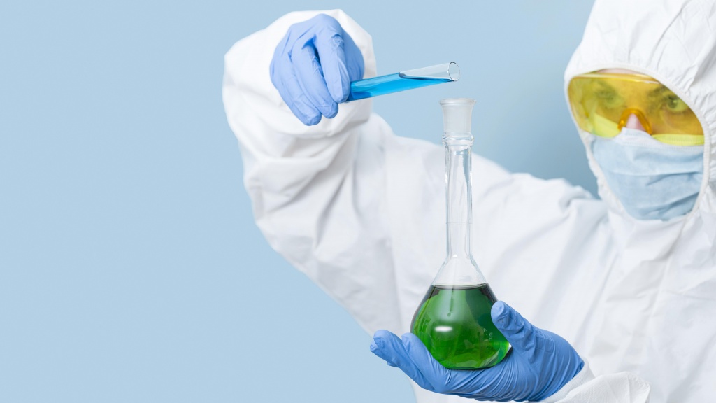 scientist-mixing-chemicals-with-copy-space.jpg